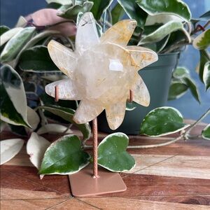 Golden healer sun on stand